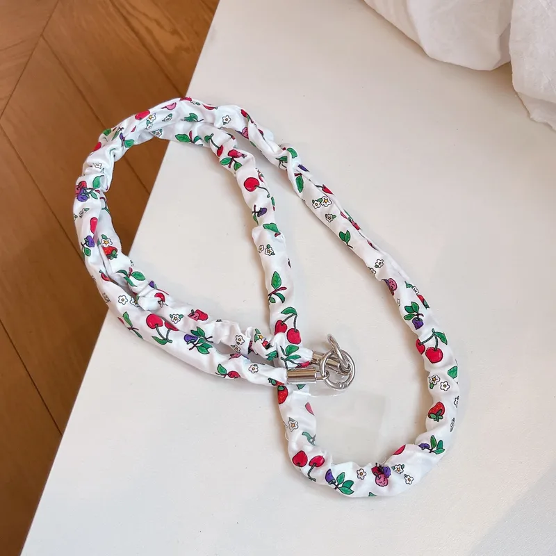 COLLIER DE TELEPHONE EN TISSU BLANC / CERISES 